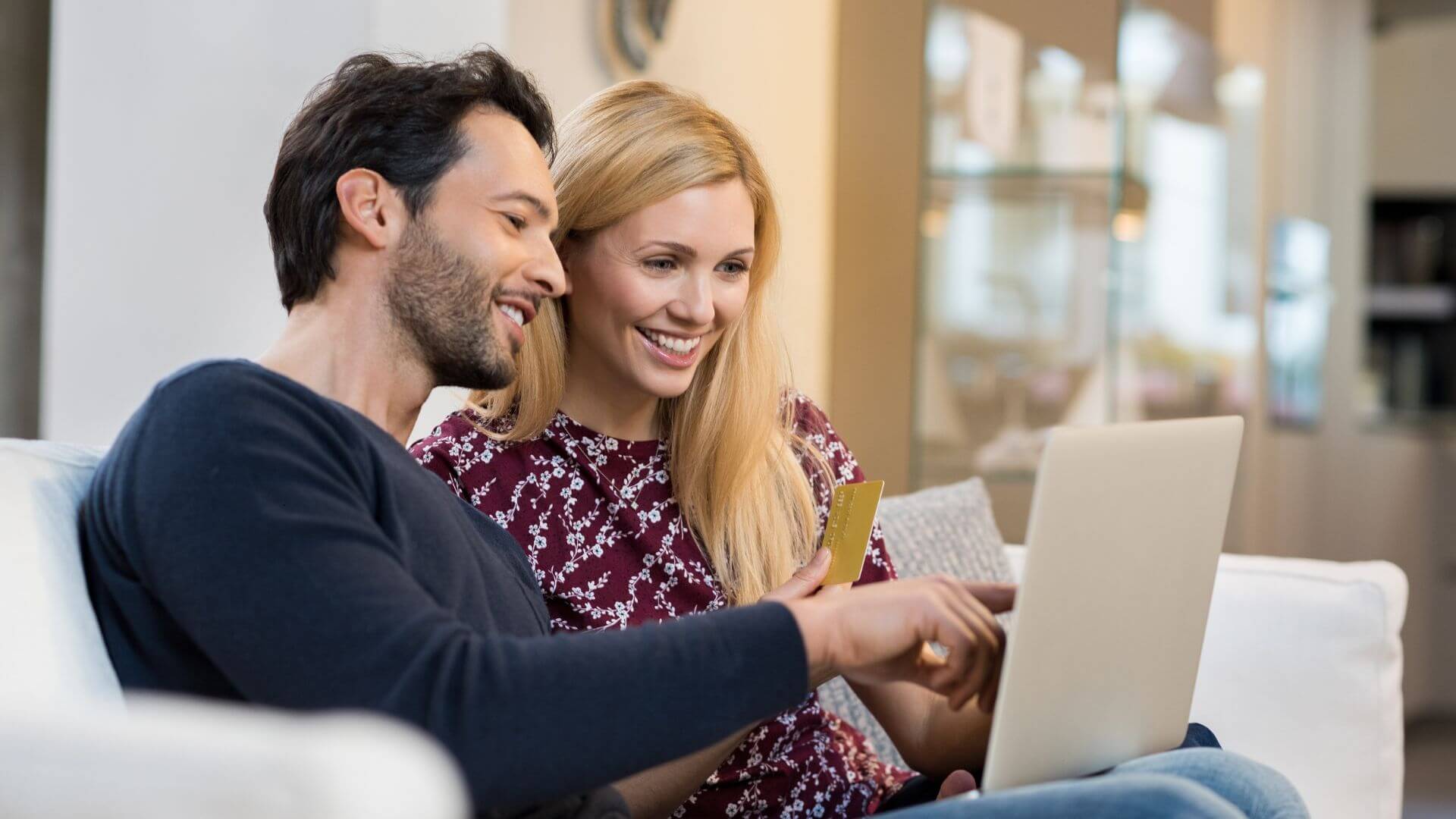 couple smiling at water bill